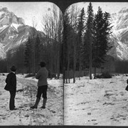 Cover image of [Byron Harmon and Elliott Barnes on Banff street (Muskrat St.?) with Cascade Mountain beyond]