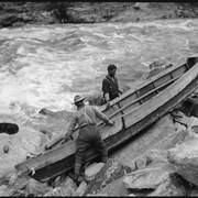 Cover image of Men portaging boat