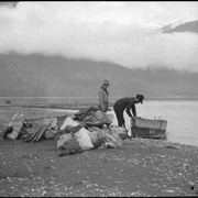 Cover image of Men unloading boat on Columbia River
