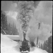 Cover image of 32. Glacier winter scene, train with snowplow