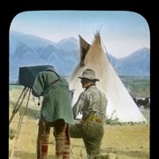 Cover image of [Elliott Barnes showing unidentified person with camera]-