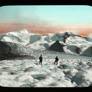 Cover image of [Conrad Kain and unidentified climber near the Extinguisher Tower on the Upper Robson Glacier]