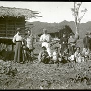 Cover image of 
[3 ladies with people in village]