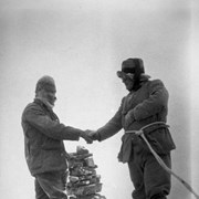 Cover image of Edward Feuz (left) and Col. Amery on summit during first ascent of Mount Amery