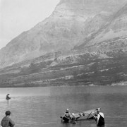 Cover image of Early F.H.R. patrons at their "tent and boat stand" on Cameron Bay Waterton Lakes Alberta