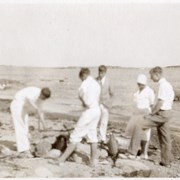 Cover image of Group of people on beach - blurry