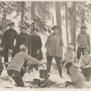 Cover image of Group of people around campire