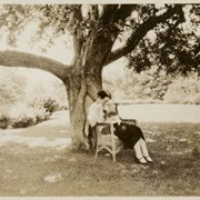 Cover image of [Catharine Robb Whyte sitting under a tree with cat]