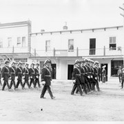 Cover image of Men in uniform marching