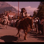 Cover image of George McLean (Tatâga Mânî) (Walking Buffalo) at Banff Indian Days parade