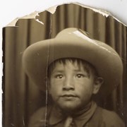 Cover image of Boy in cowboy hat