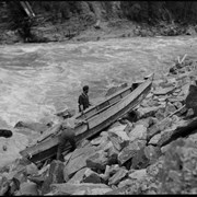 Cover image of Men portaging boat