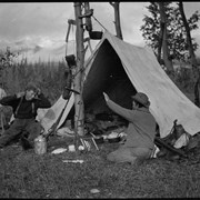 Cover image of Elliott Barnes and Ole Garrett in camp