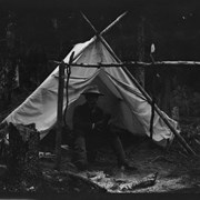 Cover image of Grandfather Barnes in front of tent