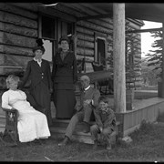 Cover image of Family on porch of Jumping Pound homestead