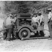 Cover image of Warden Training, Fire Pump Exercise, New Fire Pump, Cuthead Camp, 1955