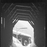 Cover image of 32. Glacier winter scenes, train entering snowshed