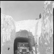 Cover image of Car in snow tunnel