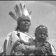 Cover image of Unidentified woman and baby in regalia at Banff?