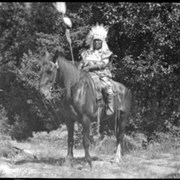 Cover image of Unknown person in regalia on horse