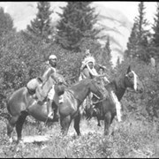 Cover image of Nancy Ear on far horse with child and unknown woman