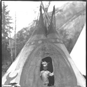 Cover image of Unidentified child in tepee