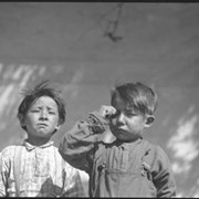 Cover image of Two children, Gordon Hunter on right