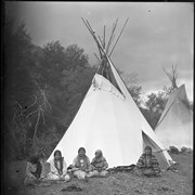 Cover image of [Unknown women sitting by tipi]