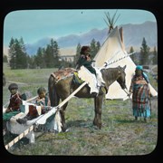 Cover image of [Unidentified woman and children with travois]