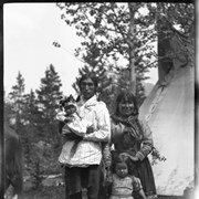 Cover image of Unidentified family in front of teepee