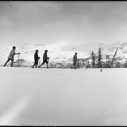 Cover image of B. Gordon, G. Harrison, two Swiss Guides skiing near Lake Louise