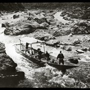Cover image of 
[Boat in rapids]