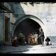 Cover image of 
[People walking through tunnel]