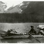 Cover image of [Man rowing boat on Maligne Lake]