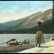 Cover image of The Opal Hill. [Mrs. Carrie Sharpless and Paul Sharpless with boat on the shore of Maligne Lake]