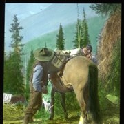 Cover image of [Jim Simpson & unidentified man packing a horse]