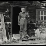 Cover image of [Joe Smith in front of his cabin at Silver City]