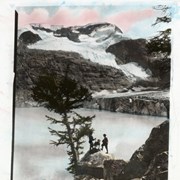 Cover image of [Two people and dog near Lake of the Hanging Glacier]