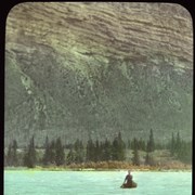 Cover image of Mr. [Elliott] Barnes crossing Sask. [Saskatchewan] River in canvas canoe