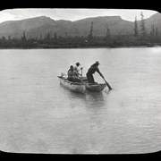 Cover image of [Crossing Maligne River in dug-out canoes]