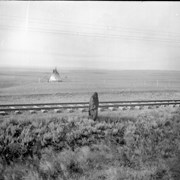 Cover image of Indigenous person and teepee near Medicine Hat, Alberta