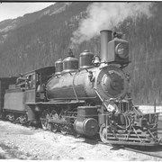 Cover image of 95 ton locomotive at Field, used to haul trains up upper Kicking Horse Pass (No.63). 7/ /94