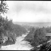 Cover image of Looking down Chicoutami River towards town of Chicoutami (No.54). 8/3/95