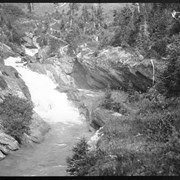 Cover image of Opening to cave, river disappearing. 1905 [file title]