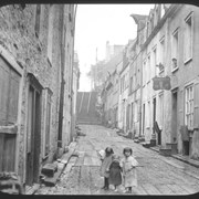 Cover image of A Quebec Street scene, Rue Petit Champlaine  / Wm. S. Vaux Jr.