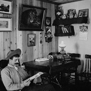 Cover image of [Bill Peyto reading in his home, Banff]