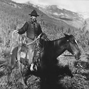 Cover image of Tom Lusk on a horse