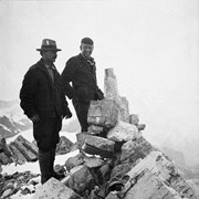 Cover image of Conrad Kain (left) and J. Monroe Thorington at summit of Trapper Peak (9790') [in Waputik Range near Bow Lake, Banff]