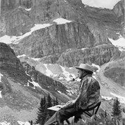 Cover image of [A.C. Leighton painting mountain scene at Valley of the Ten Peaks]