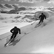 Cover image of [Unidentified skiers at area of Surprise Point and Standish Hump, which rises to the right of Sunshine Lodge, ca. 1940]
